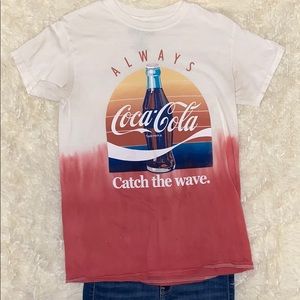 A multicolored Coca-Cola tee